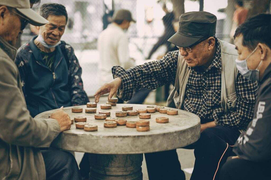 Open-Face Chinese Poker: A Game of Skill and Strategy